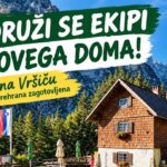 Mihov dom na Vršiču, lesena planinska koča pod gorami, z napisom »Pridruži se ekipi Mihovega doma! Delo na Vršiču, bivanje in prehrana zagotovljena«.